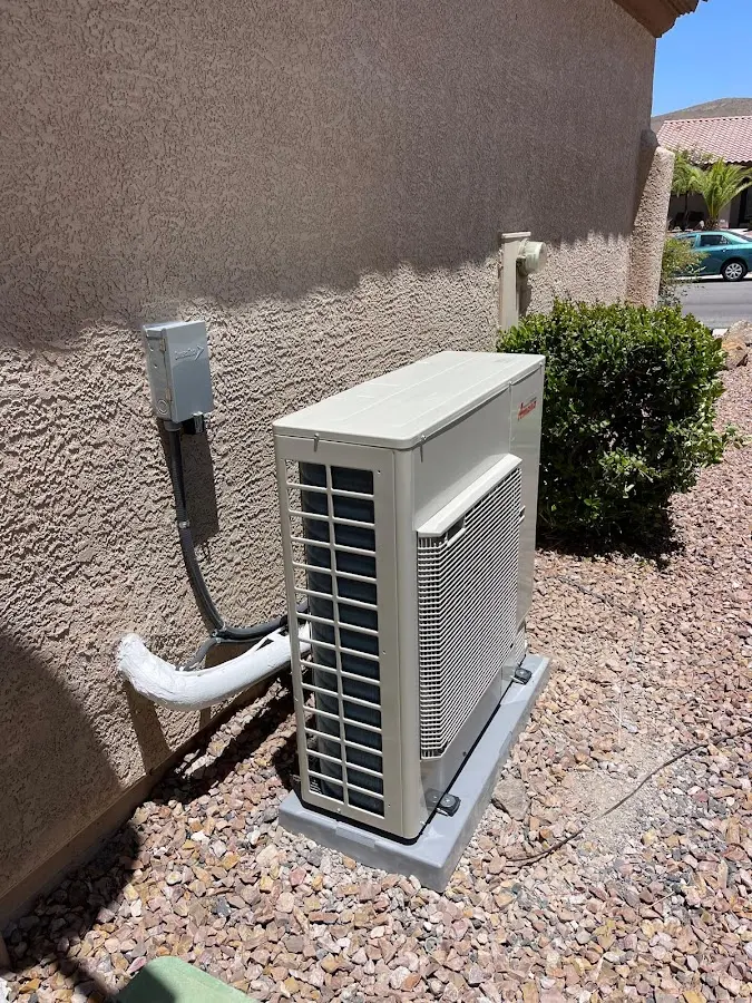 Residential air conditioning condenser unit in Baker